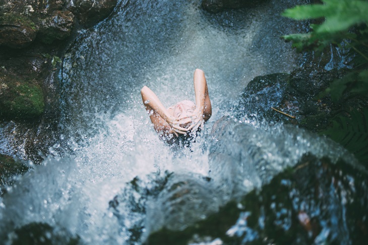 woman wild swimming in natural waters