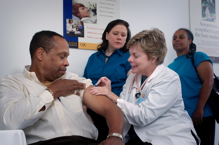 person receiving covid vaccine